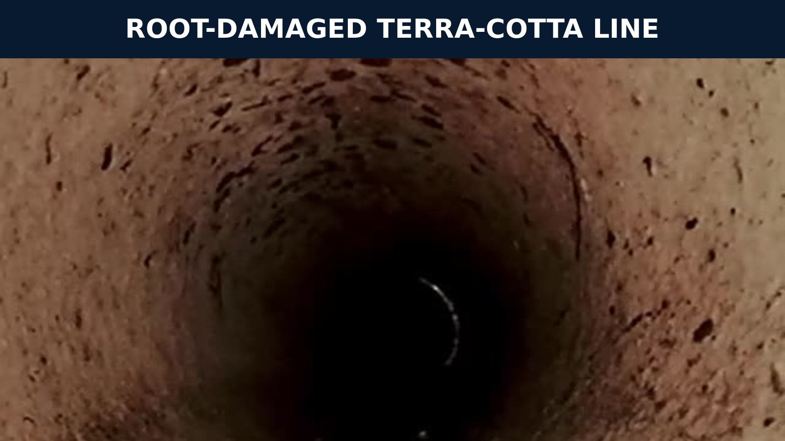 Camera view inside a damaged terra-cotta sewer line at a Baton Rouge multifamily property